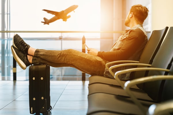 man waiting in an airport