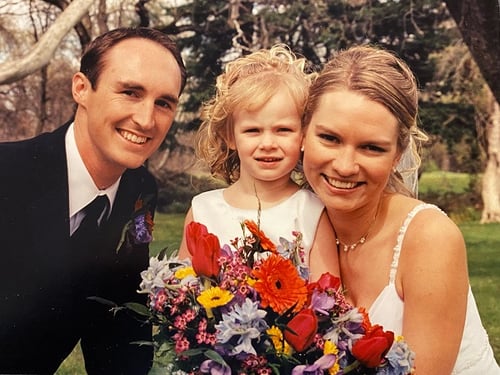 Michale and Amy Wadlow with their flower girl on their Wedding Day