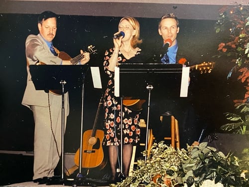 Jim White playing guitar, Linda and Andrew Burchett singing "Brushstrokes" at Wadlow Wedding